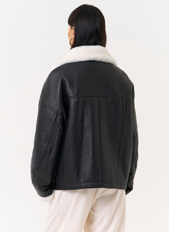 Женская натуральная дубленка черного цвета